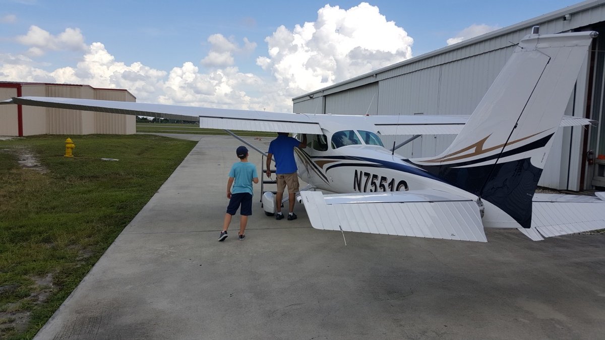 Uncle Nik with an airplane, ready for the next adventure